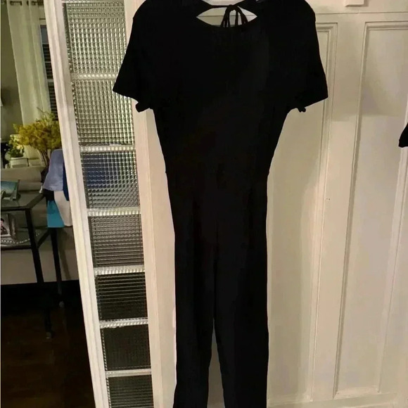 Pretty little things ribbed jump suit. Black short sleeve full open back… - Picture 1 of 12